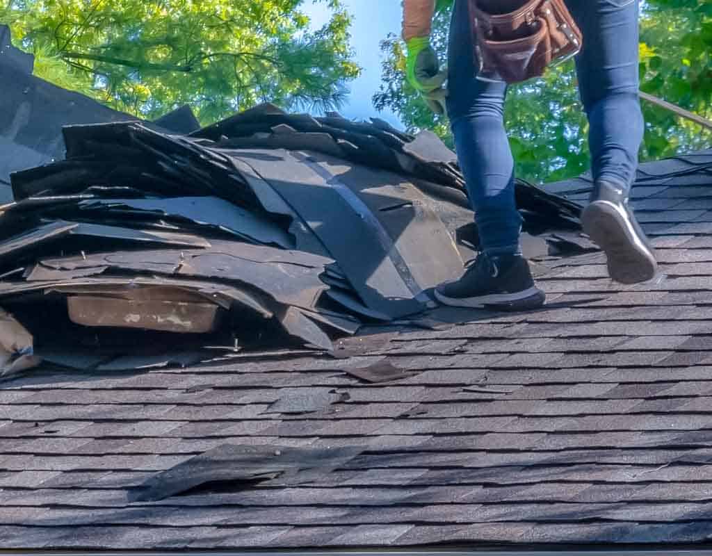 Professional roofer replacing a residential roof in New England, professional residential roofer in New England, Halley Construction Services