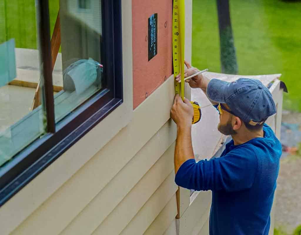 Professional siding repairing a commercial siding in New England, professional commercial siding in New England, Halley Construction Services